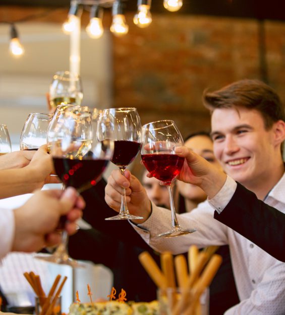 Happy co-workers celebrating while company party and corporate event